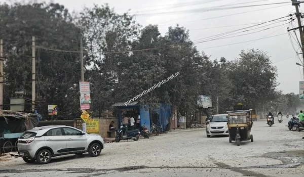 Street level view of a junction on Razak Palya road providing access to Purva Northern Lights