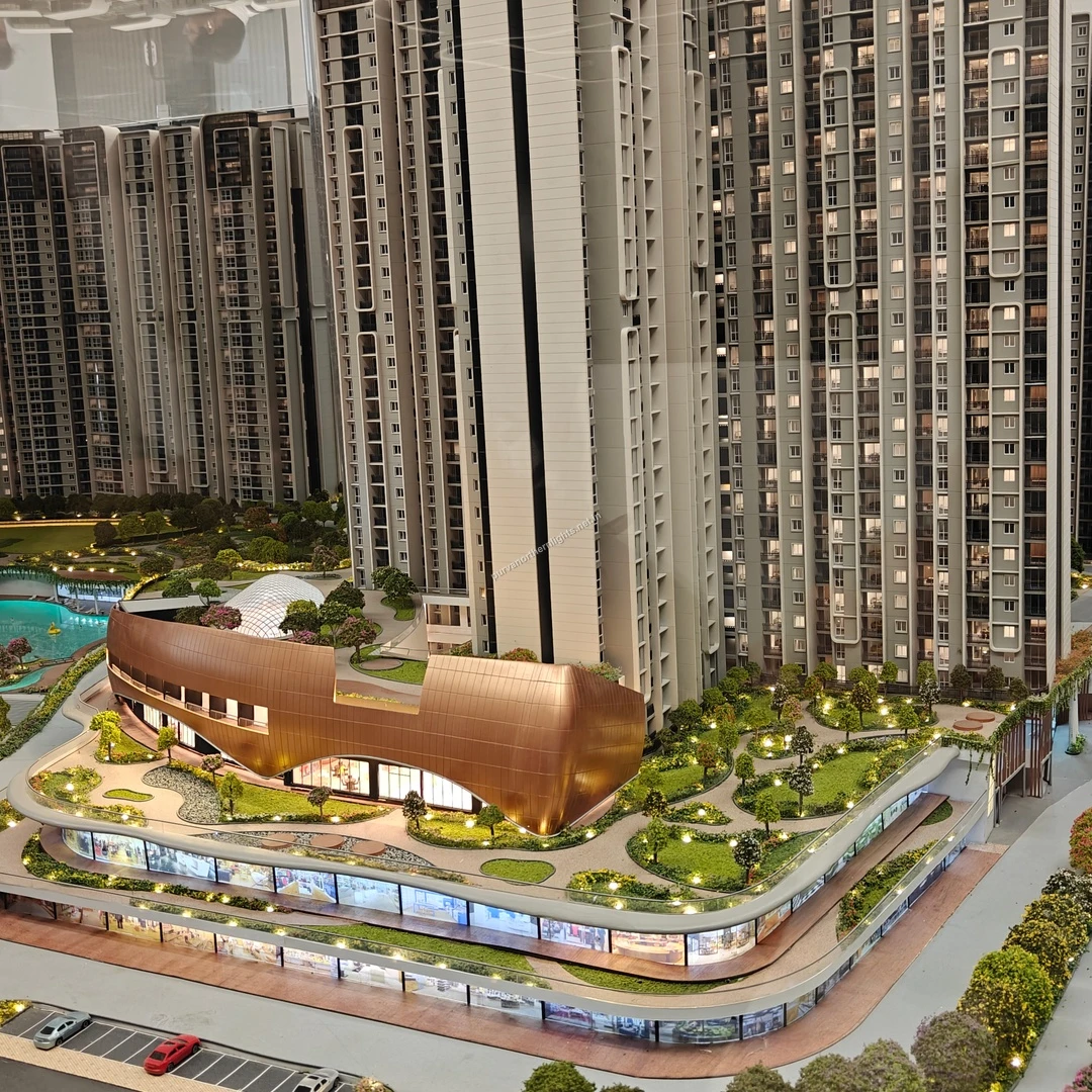 Architectural scale model highlighting the beautifully designed clubhouse facade and the terraced green roof above the lower amenities at Purva Northern Lights