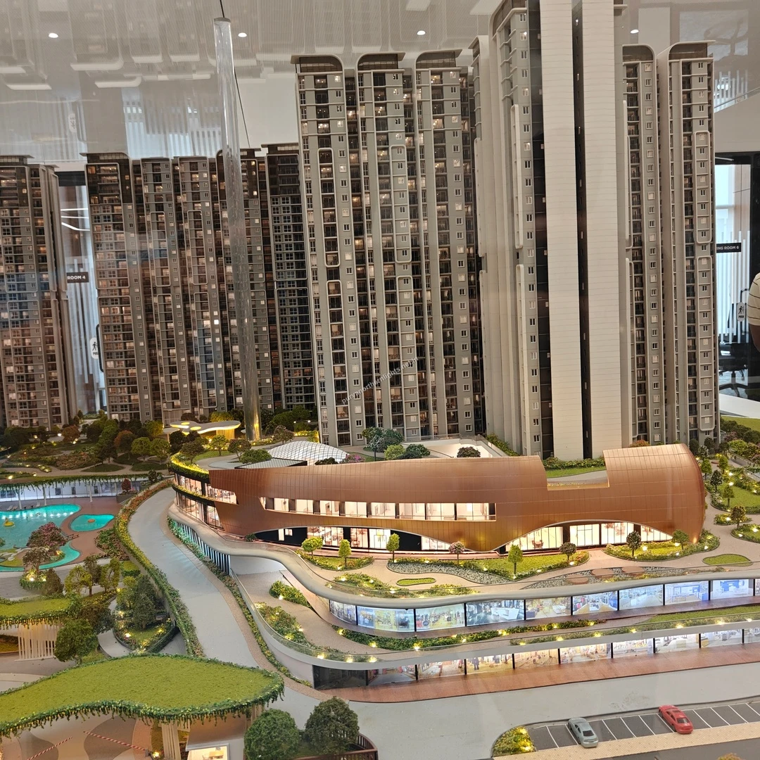 Wide miniature view taken on mar 13 showcasing the modern copper-colored clubhouse and swimming pool amenities at Purva Northern Lights