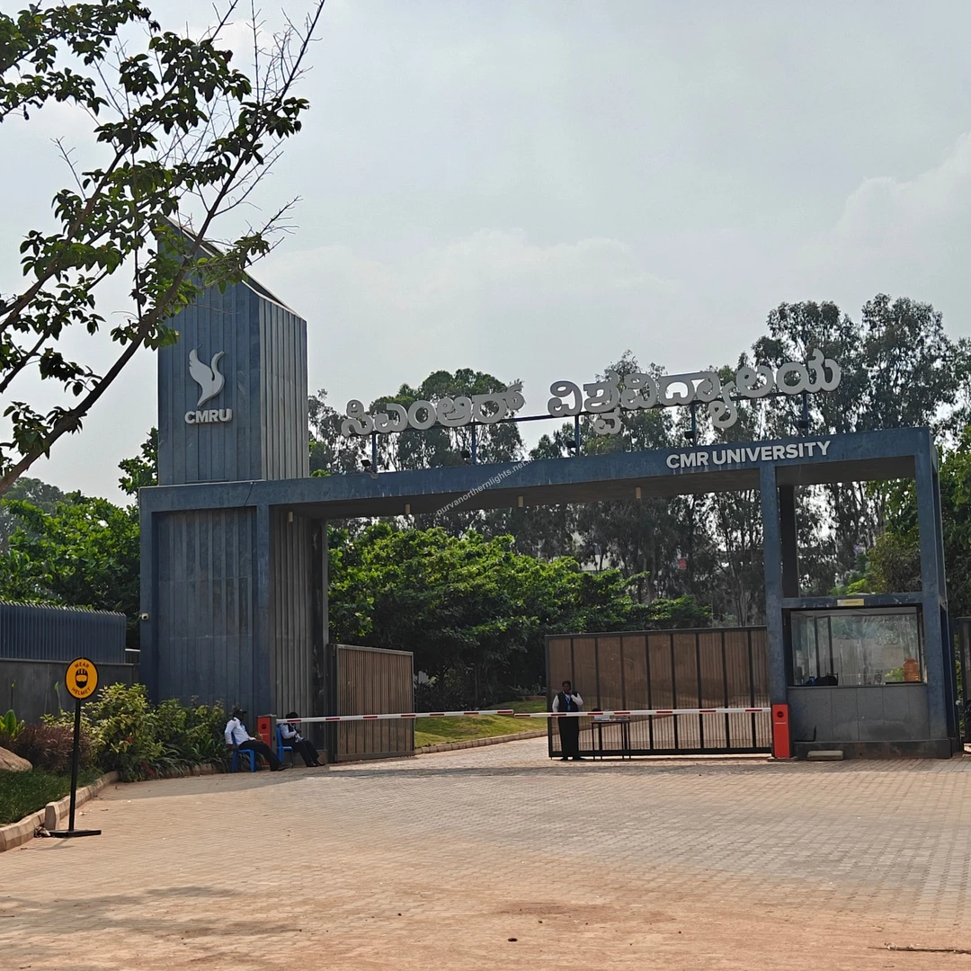 CMR Campus Entrance A clear daytime view of the CMR University entry gates with security personnel monitoring the entrance on Mar 13.