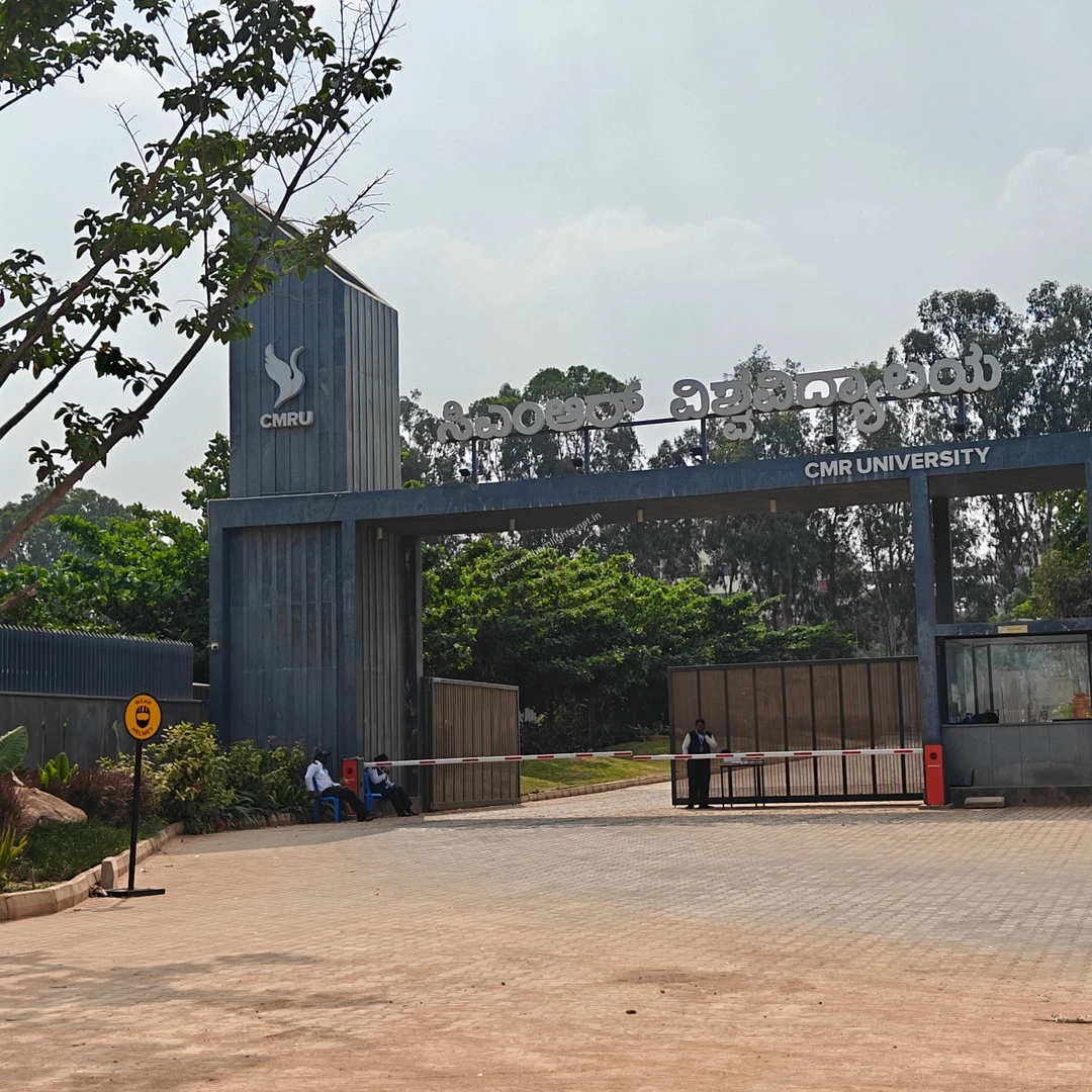 CMR University Gate The grand main entrance gate of CMR University featuring modern architecture and security barriers near the residential community.