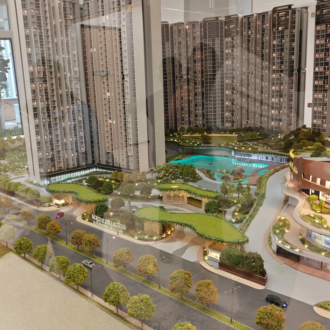 Detailed miniature model displaying the grand entrance architecture and lush green landscaping of Purva Northern Lights