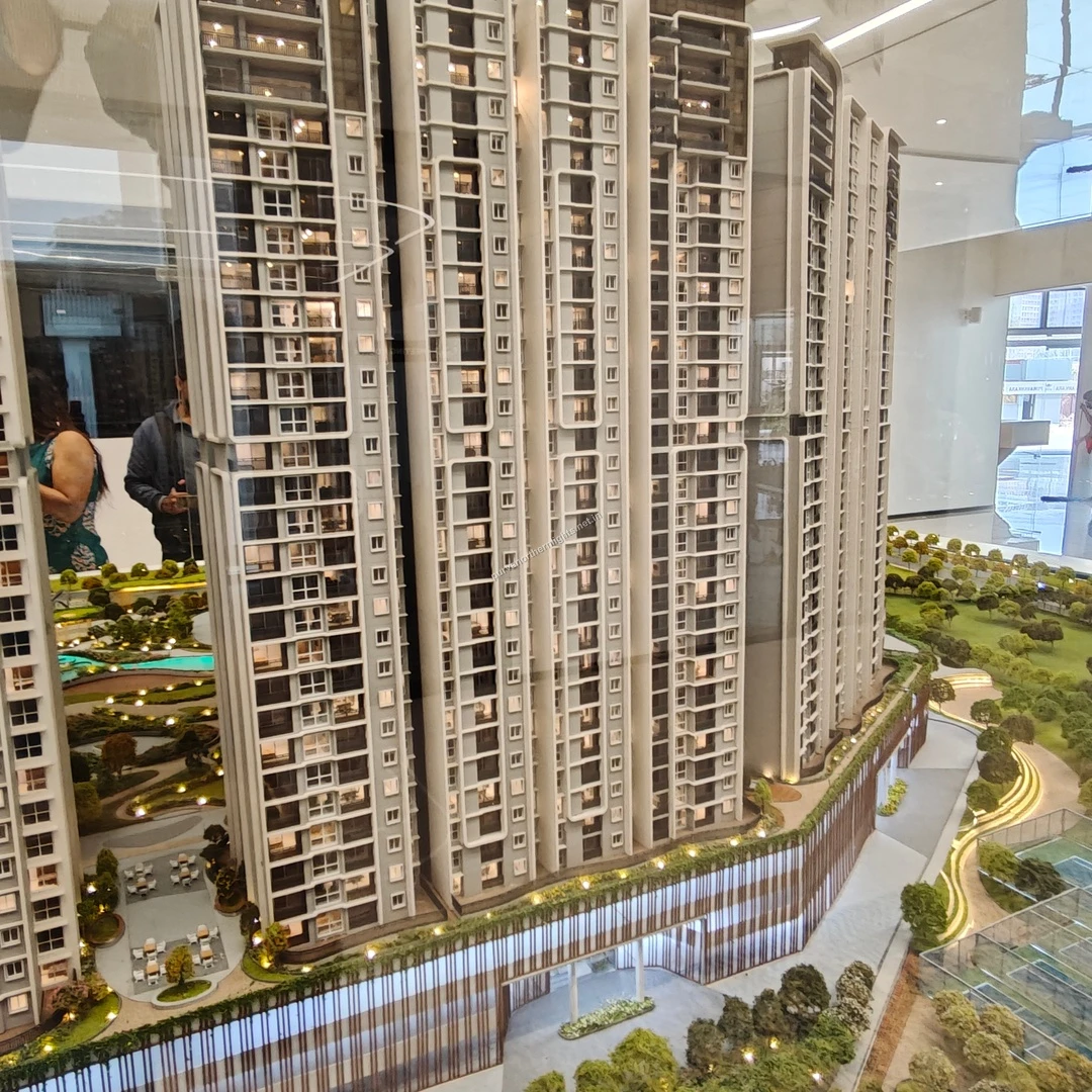 High angle perspective of the miniature building model featuring the lower entrance walkway and surrounding greenery at Purva Northern Lights