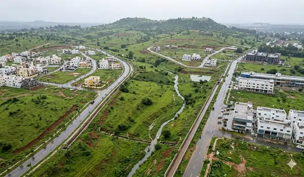 Investing in Bagalur? Discover how the natural topography and advanced drainage systems protect property values during the monsoon. Secure your investment today.