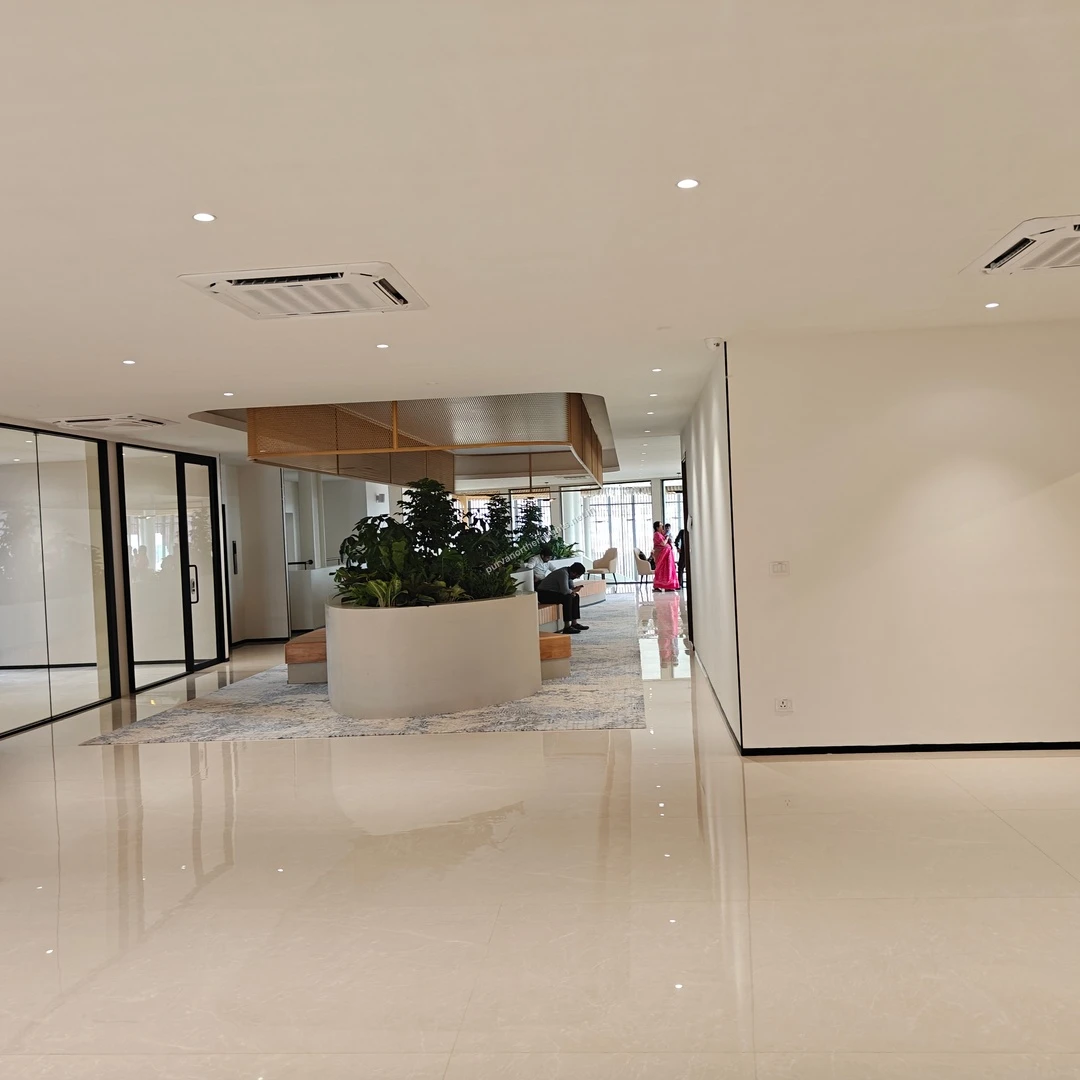 Comfortable client lounge area with contemporary indoor landscaping at the Purva Northern Lights office