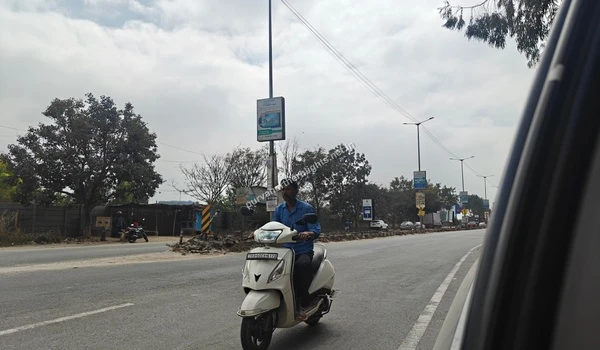 View of the main road with commuter traffic near Purva Northern Lights