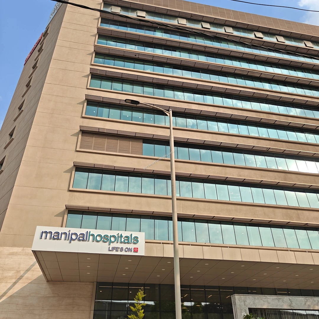 Impressive architecture of the Manipal Hospitals branch ensuring top-tier emergency and clinical services for Purva Northern Lights residents.
