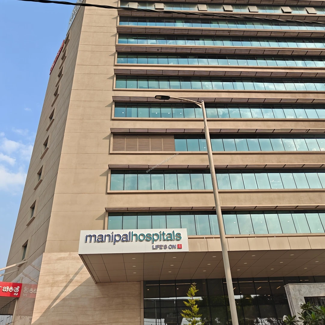 The towering structure of Manipal Hospitals observed this Mar 13 indicating world-class medical care proximity to Purva Northern Lights.