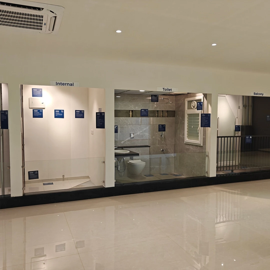 Detailed material exhibits showcasing premium bathroom fittings for Purva Northern Lights units, displayed on mar-13