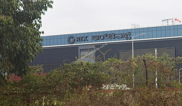 Exterior view of the RTX corporate facility with prominent signage located in the Aerospace Park near Purva Northern Lights