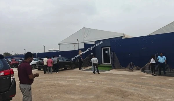 Active site parking lot showing visitors and parked vehicles situated conveniently near the Purva Northern Lights sales office building