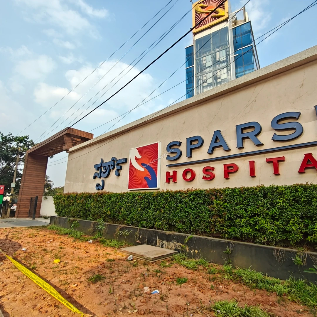 Clear visibility of the Sparsh Hospital nameplate from the street ensuring easy navigation to medical help from Purva Northern Lights.