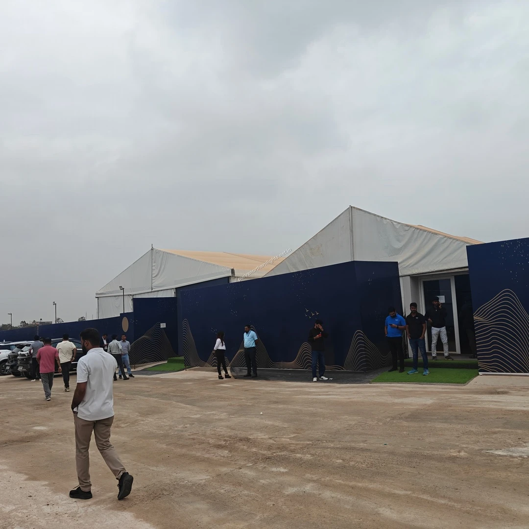 Exterior facade of the temporary project sales office at Purva Northern Lights featuring blue decorative panels