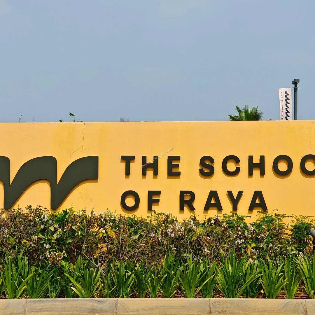 Raya Institute Sign The distinctive black lettering of The School of Raya on a bright yellow wall, captured on a sunny afternoon this Mar 13.